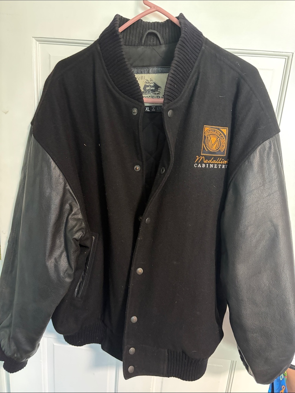 Medallion Cabinetry Men's Black Varsity Jacket with Leather Sleeves